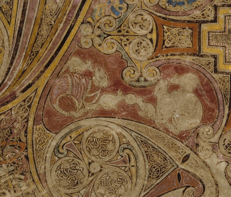 Two cats feature in an illustration from the Book of Kells