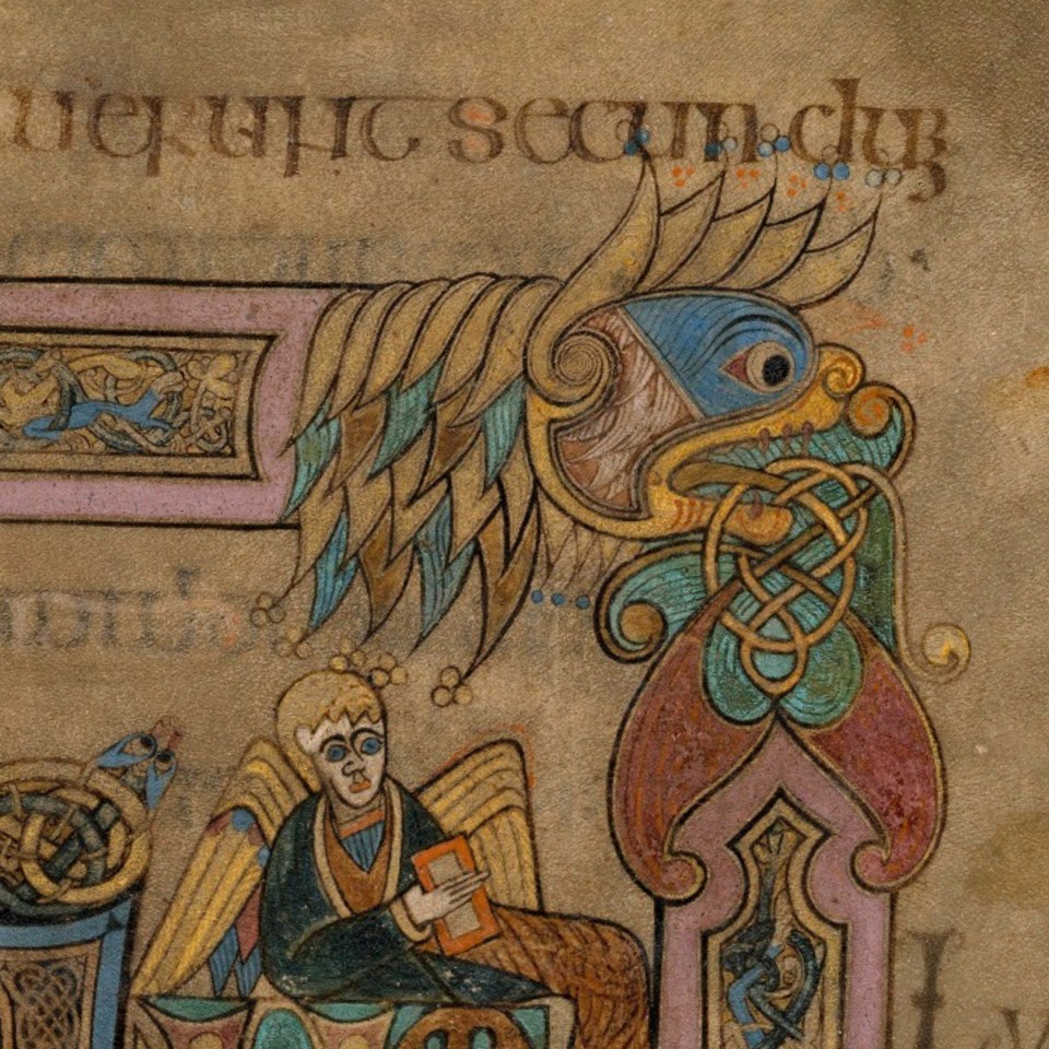 A close-up of a lion and an angel in the Book of Kells