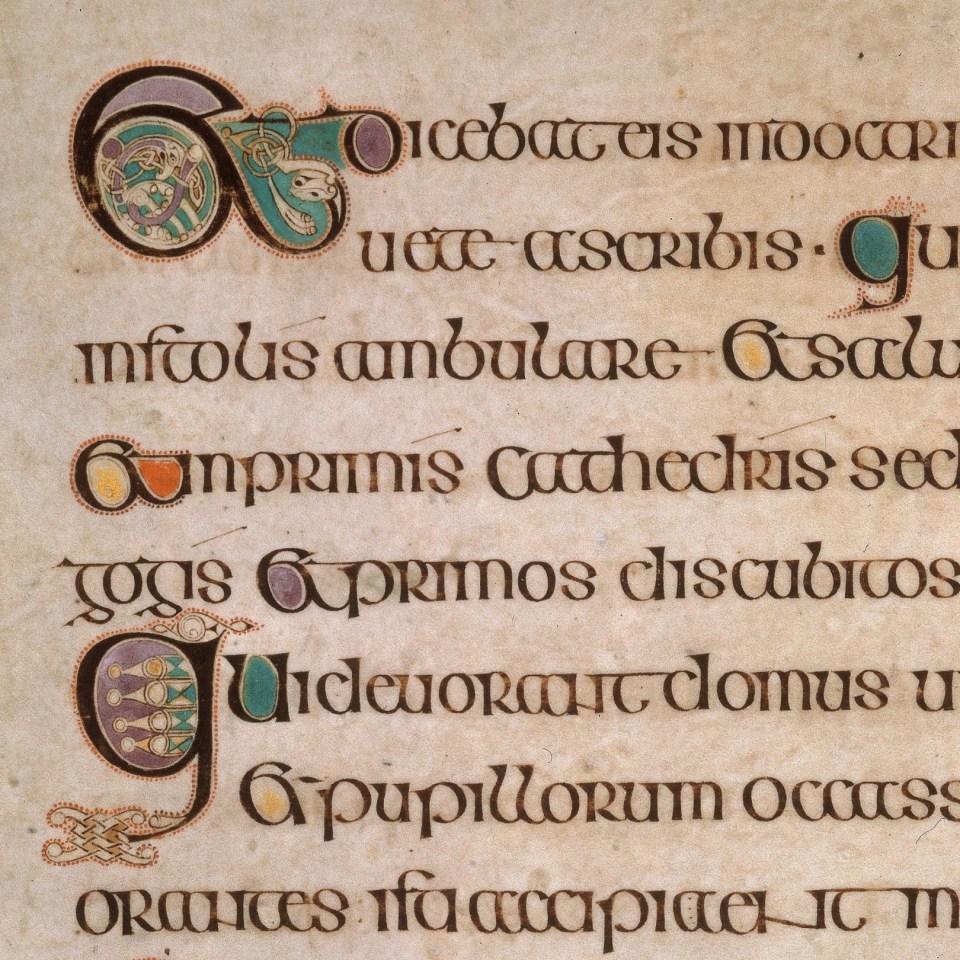 A close up of latin text from the Book of Kells written in a style called insular majuscule