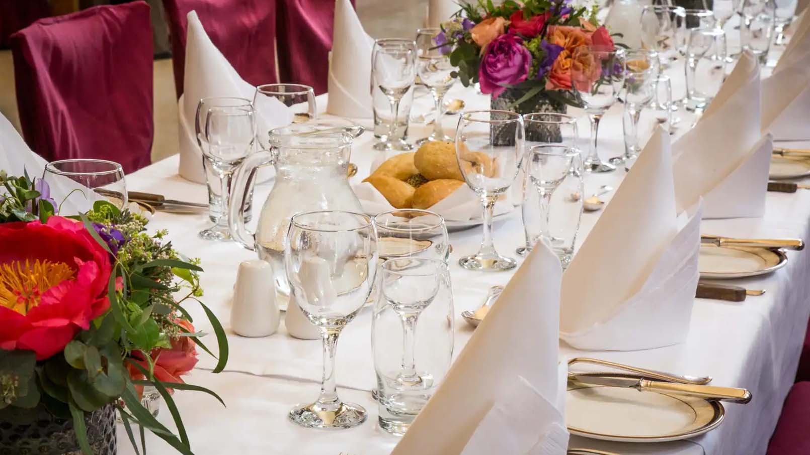 dressed table with floral arrangements