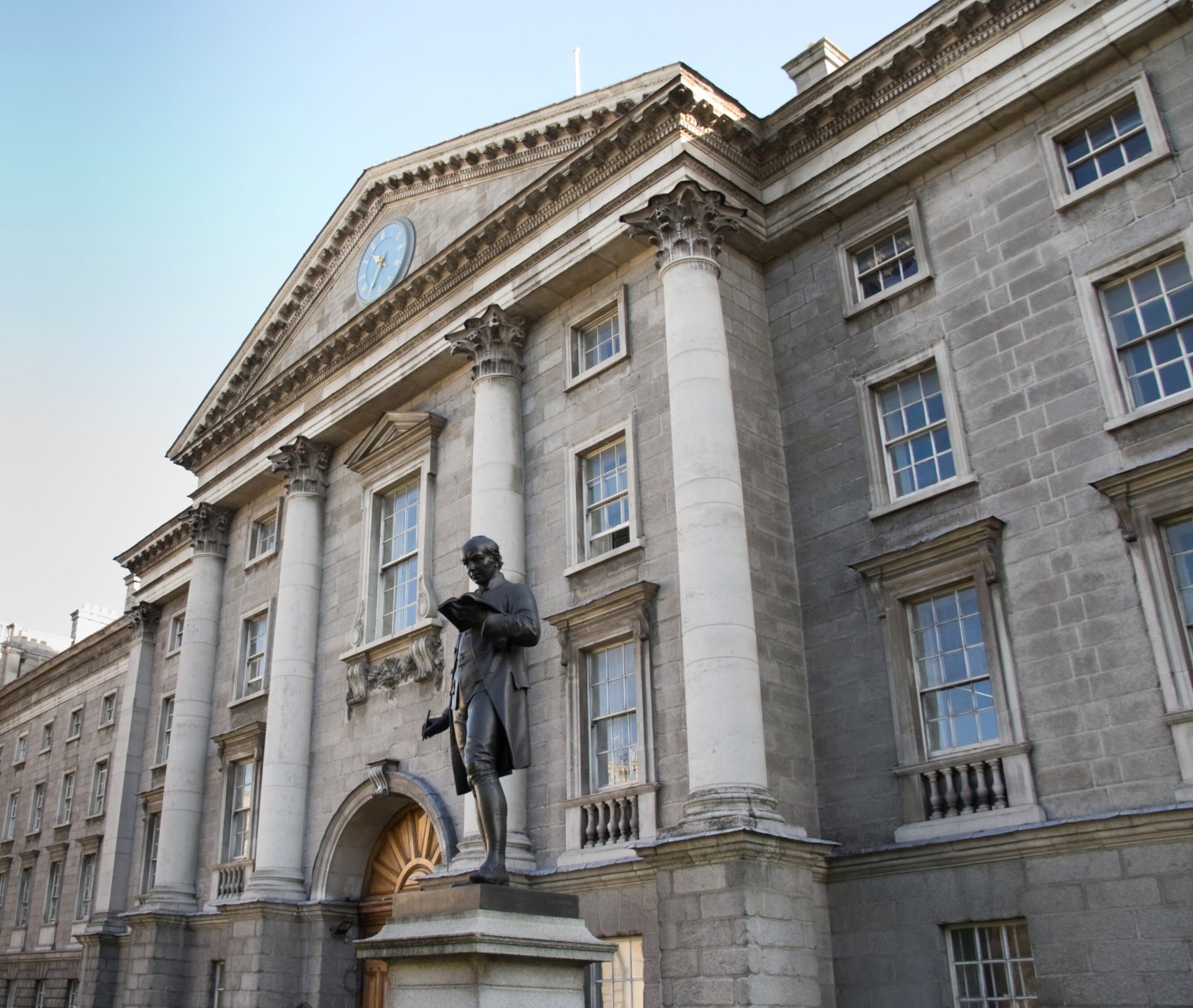 Grey stone and pillars of the front of Trinity College Dublin