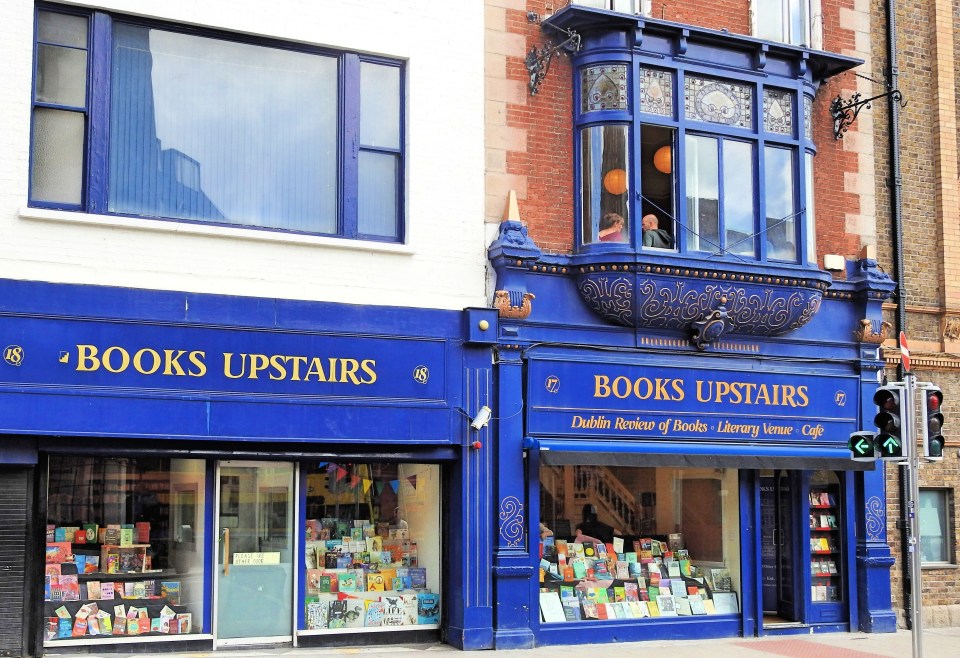 Books Upstairs outside view of blue two story building