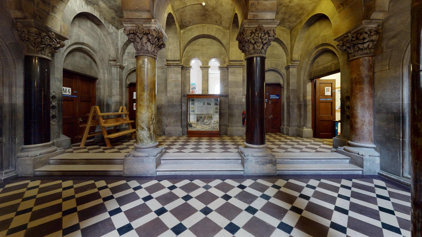 Chequered floor and marble pillars in the Museum Building